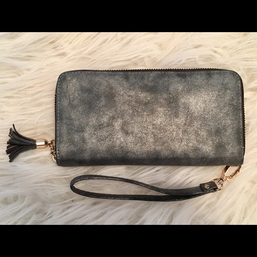 Metallic wallet with wrist strap